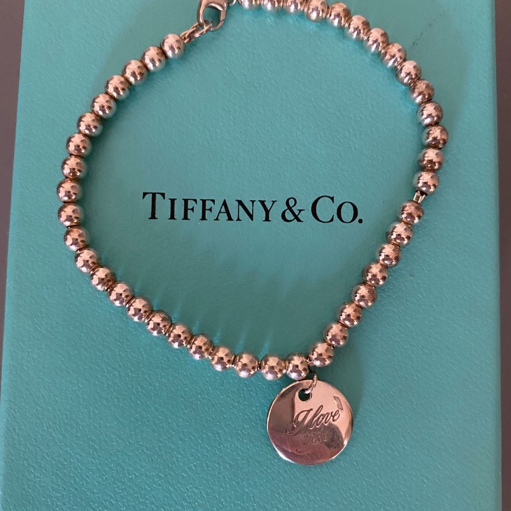 Tiffany & Co “I love you” disc charm bracelet
